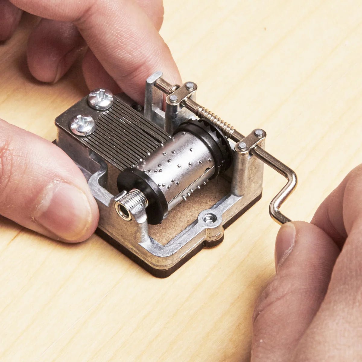 Unveiling the Magic: Exploring the Inner Workings of a Music Box Mechanism - Curious Melodies